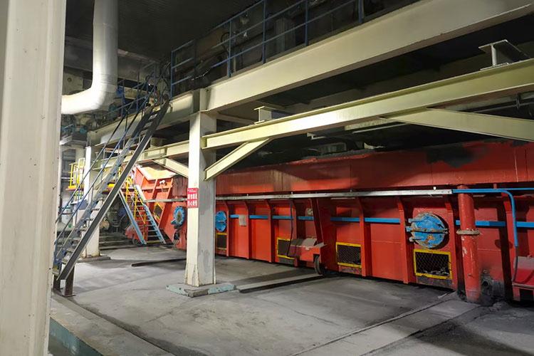 Submerged scraper slag conveyor