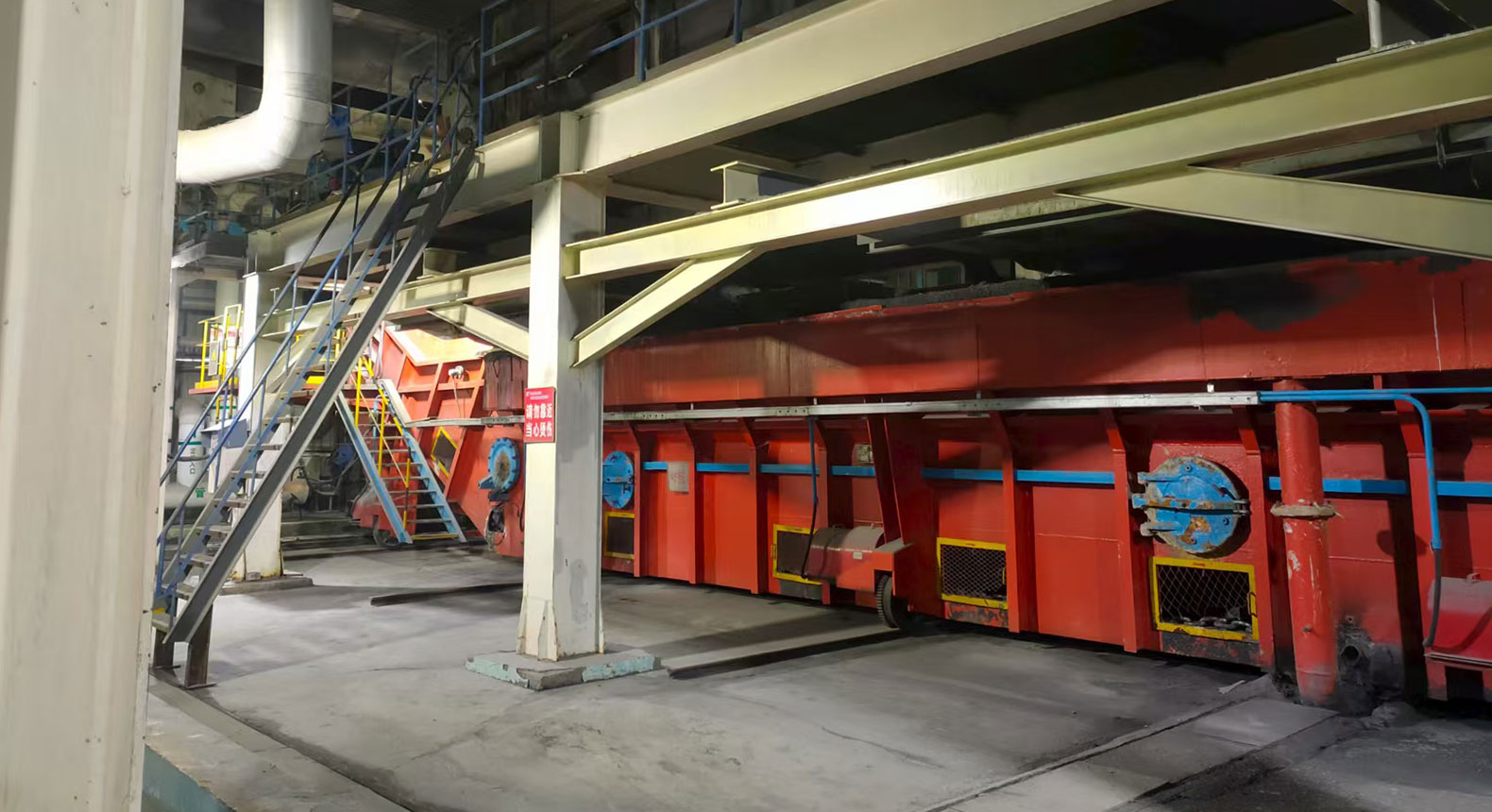 Submerged scraper slag conveyor